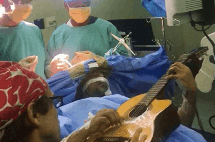jazz musician plays guitar during his brain surgery video goes viral