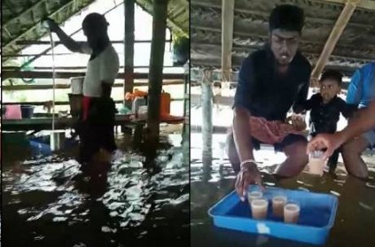 keralites drinking chaya in flood