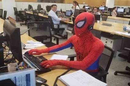 man comes to office in spider man dress on his last day of work